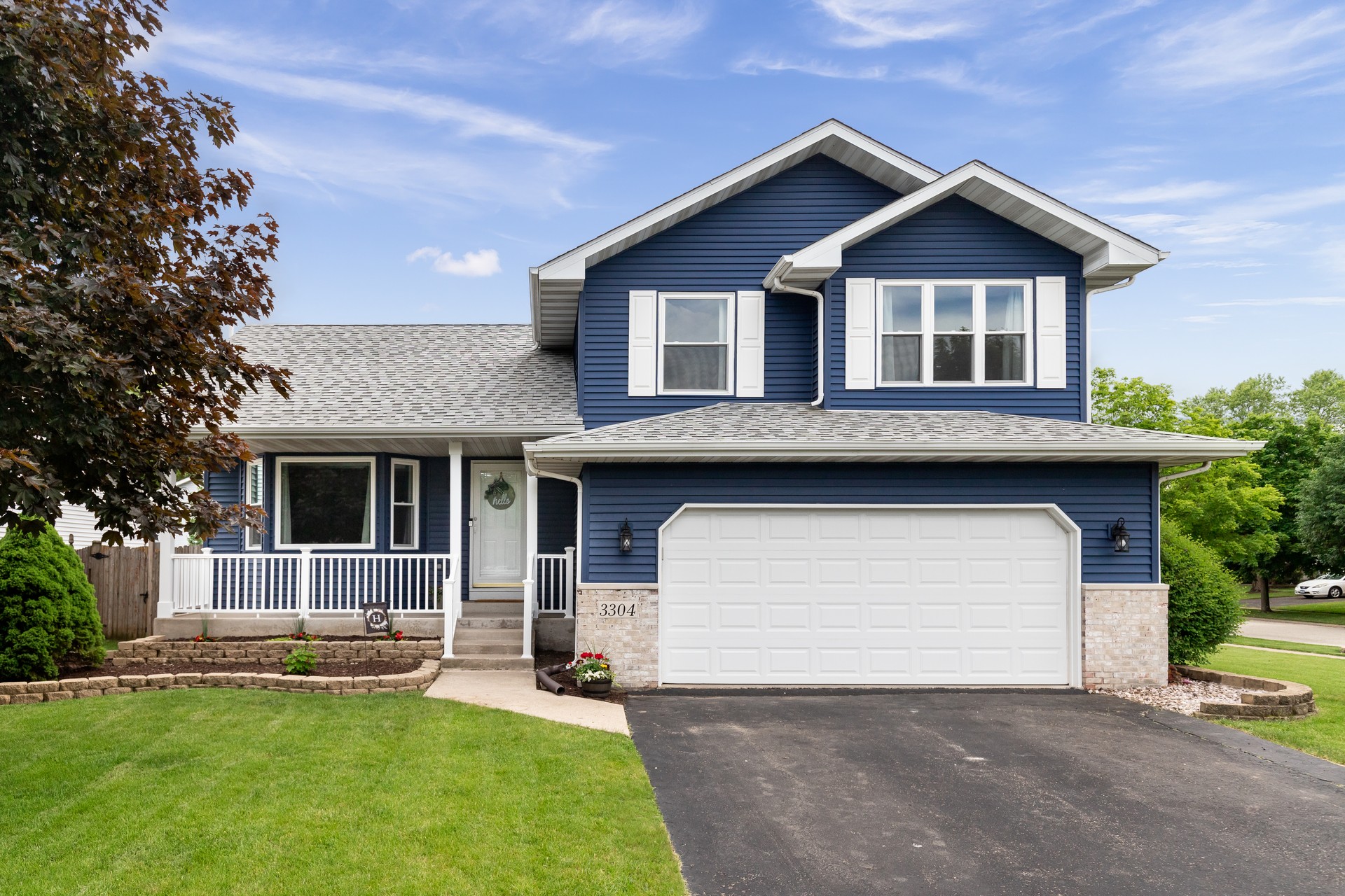 Exterior of a blue suburban home.